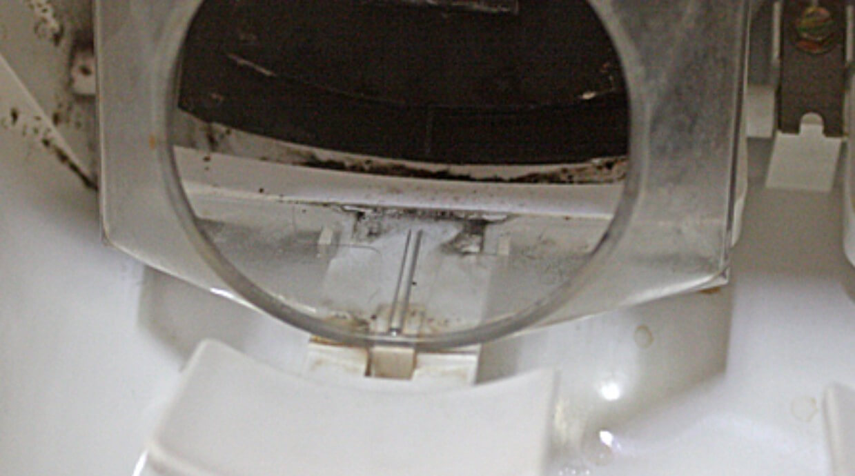 How To Clean Kenmore Elite Refrigerator Water Dispenser?