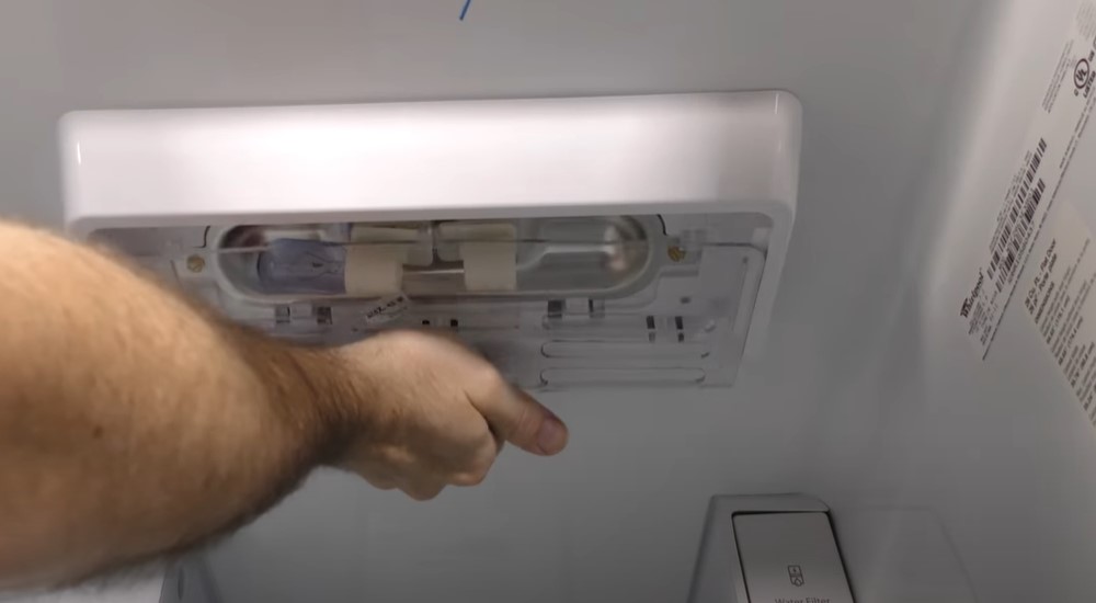 how to remove led light bulb cover in whirlpool refrigerator