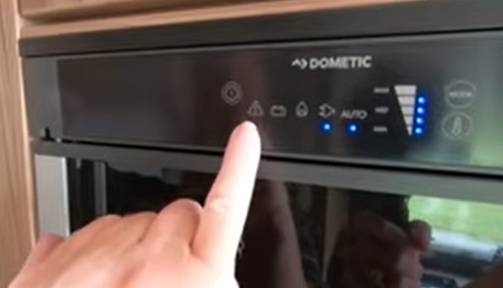 Where is the Reset Button on a Dometic Refrigerator